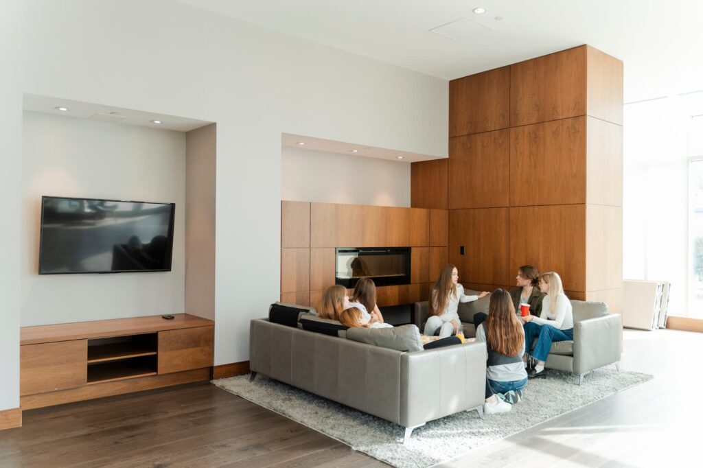 Modern living room with built-in storage, an example of what an apartment renovation in Kigali can achieve
