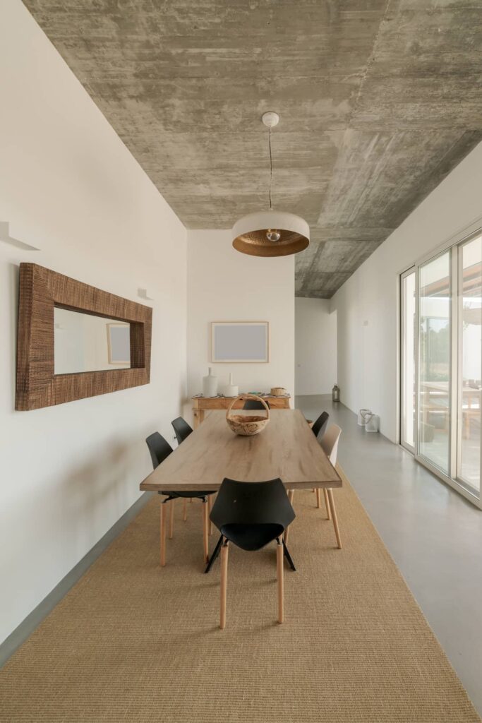 Open dining area next to the kitchen, an example of open-plan kitchen design in Rwanda